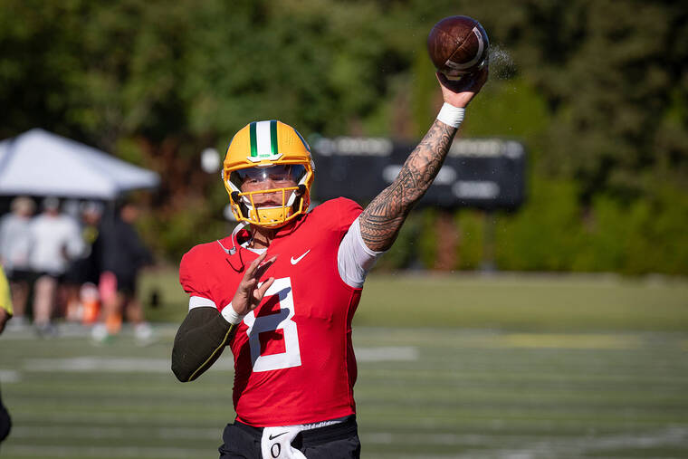 THE REGISTER-GUARD / USA TODAY NETWORK
                                Oregon quarterback Dillon Gabriel throws out a pass during practice with the Oregon Ducks today at the Hatfield-Dowlin Complex in Eugene, Ore.