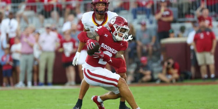 Sep 30, 2023; Norman, Oklahoma, USA; Oklahoma Sooners defensive back Billy Bowman Jr. (2) makes an interception during the first half against the Iowa State Cyclones at Gaylord Family-Oklahoma Memorial Stadium. Mandatory Credit: Kevin Jairaj-USA TODAY Sports