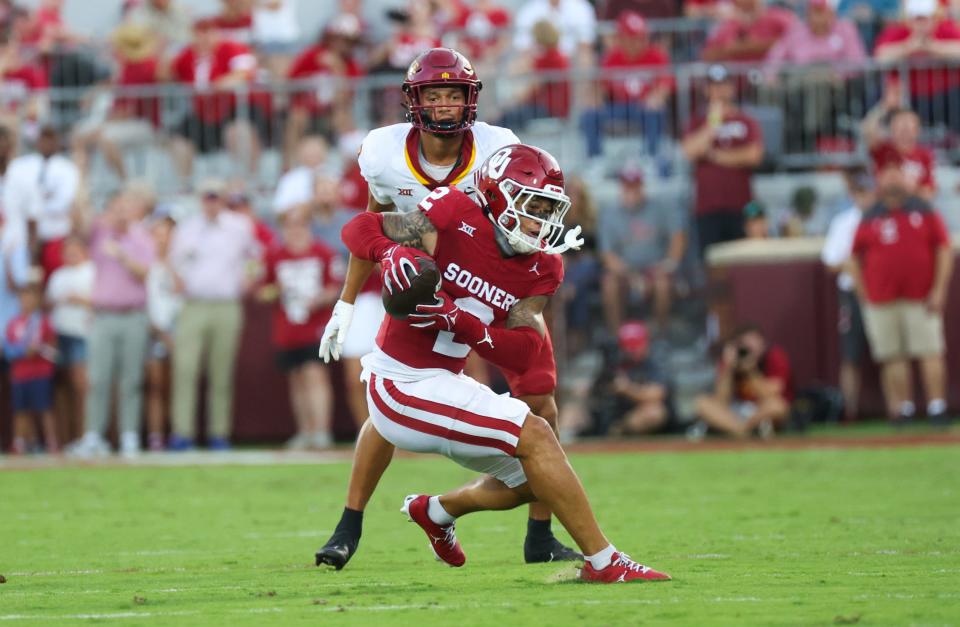 Sep 30, 2023; Norman, Oklahoma, USA; Oklahoma Sooners defensive back Billy Bowman Jr. (2) makes an interception during the first half against the Iowa State Cyclones at Gaylord Family-Oklahoma Memorial Stadium. Mandatory Credit: Kevin Jairaj-USA TODAY Sports