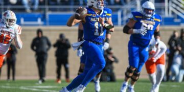 SDSU's quarterback Mark Gronowski (11) runs with the ball during a game against Mercer University on Saturday, Dec. 2, 2023, at Dana J Dykhouse Stadium in Brookings.