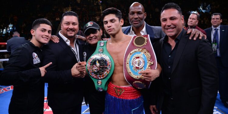 Nov 2, 2019; Las Vegas, NV, USA; Ryan Garcia (blue trunks) celebrates after knocking out Romero Duno (not pictured) in their WBC silver and NABO lightweight title bout at MGM Grand Garden Arena. Garcia won via first round TKO. Mandatory Credit: Joe Camporeale-USA TODAY Sports