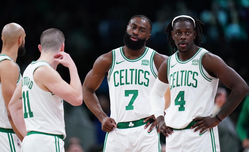 Feb 1, 2024; Boston, Massachusetts, USA; Boston Celtics guard Jrue Holiday (4), guard Jaylen Brown (7), guard Payton Pritchard (11) and guard Derrick White (9) on the court against the Los Angeles Lakers in the second half at TD Garden. Mandatory Credit: David Butler II-USA TODAY Sports