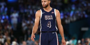 PARIS, FRANCE - AUGUST 10: Stephen Curry #4 of Team United States looks on during the Men's Gold Medal game between Team France and Team United States on day fifteen of the Olympic Games Paris 2024 at Bercy Arena on August 10, 2024 in Paris, France. (Photo by Ezra Shaw/Getty Images) ORG XMIT: 776138674 ORIG FILE ID: 2166229534