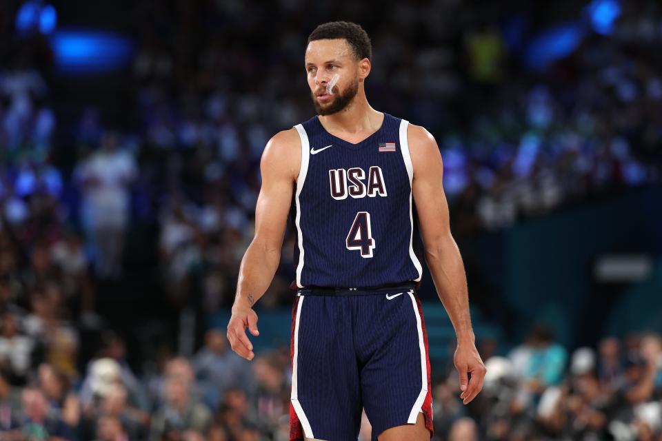 PARIS, FRANCE - AUGUST 10: Stephen Curry #4 of Team United States looks on during the Men's Gold Medal game between Team France and Team United States on day fifteen of the Olympic Games Paris 2024 at Bercy Arena on August 10, 2024 in Paris, France. (Photo by Ezra Shaw/Getty Images) ORG XMIT: 776138674 ORIG FILE ID: 2166229534