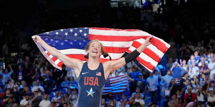 United State's Sarah Hildebrandt celebrates after defeating Cuba's Yusneylis Guzman in their...