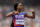 PARIS, FRANCE - AUGUST 09: Sha'carri Richardson of Team United States celebrates winning the gold medals after competing in the Women's 4x100m Relay Final on day fourteen of the Olympic Games Paris 2024 at Stade de France on August 09, 2024 in Paris, France. (Photo by Christian Petersen/Getty Images)