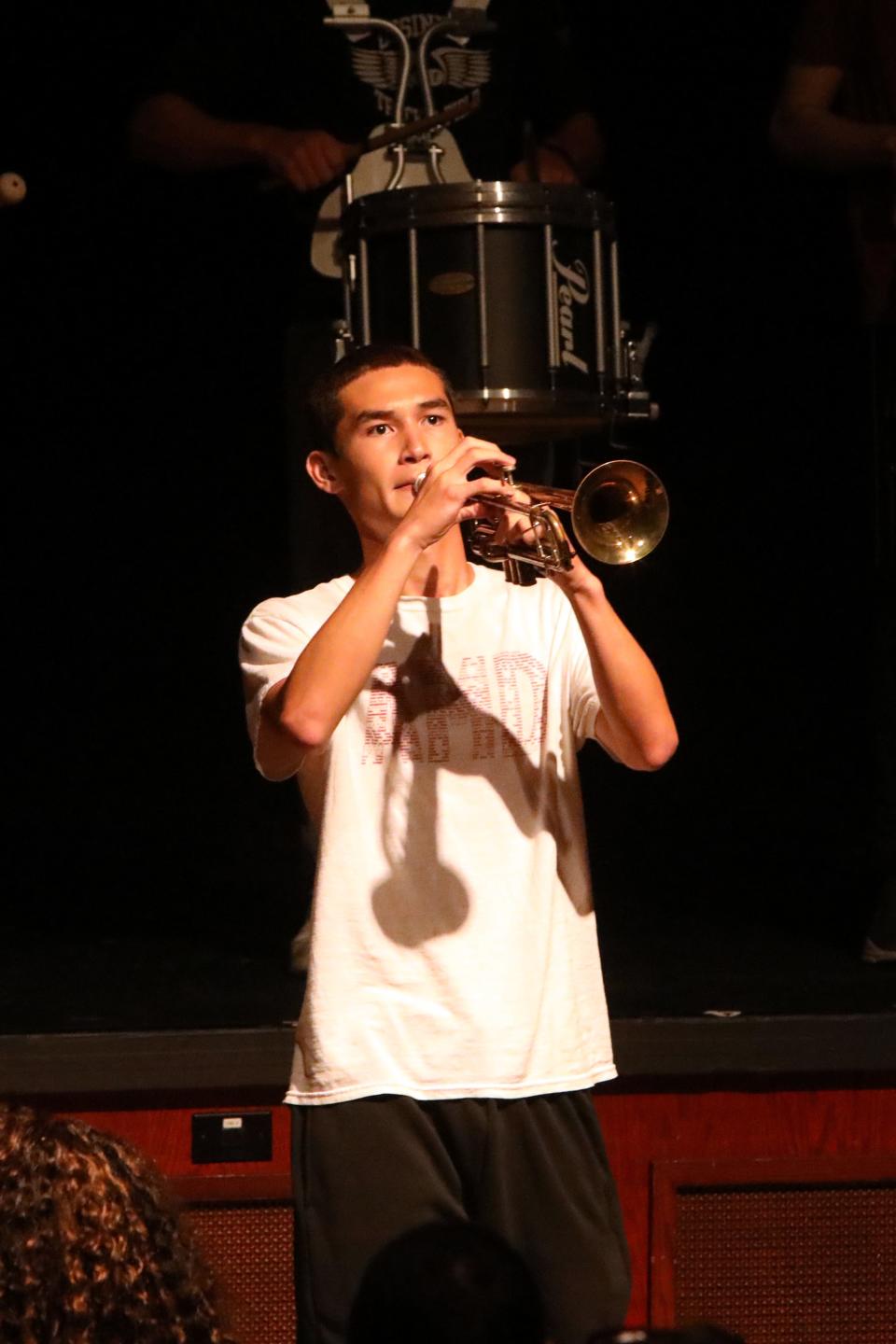 Senior Jonathan Kang plays trumpet during the marching band's performance at the back to school staff assembly at Ossining High School Aug. 28, 2024. The Ossining High School's marching band has been invited to perform in the Pearl Harbor Memorial Parade in Hawaii on December 7, 2024.