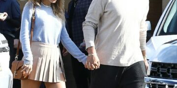 Taylor Swift and Travis Kelce - pictured in March - are reunited during her tour hiatus at her famous Rhode Island mansion