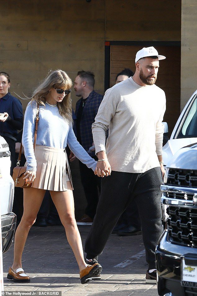 Taylor Swift and Travis Kelce - pictured in March - are reunited during her tour hiatus at her famous Rhode Island mansion