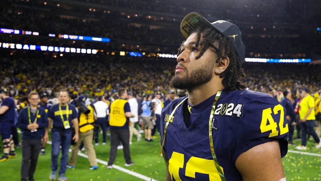 Michigan Wolverines defensive end TJ Guy (42) after the Wolverines defeated the Washington Huskies in the 2024 College Football Playoff national championship game at NRG Stadium.