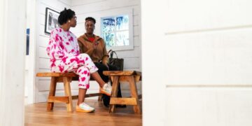 Suzanne Johnson, right, and her daughter Cameron have a discussion about the Gullah Geechee exhibit they are sitting in during a visit to the International African American Museum in Charleston, S.C., Tuesday, Jan. 23, 2024.