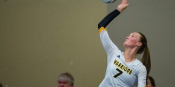 Oak Grove Warriors' Riley Edwards (7) hits the ball during MHSAA's Mississippi Volleyball Invitational at the Jackson Convention Complex in Jackson, Miss., on Friday, Aug. 2, 2024.