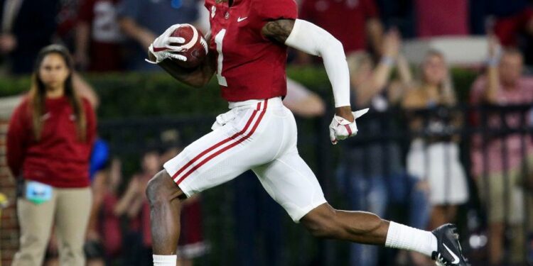 Sep 25, 2021; Tuscaloosa, Alabama, USA; Alabama Crimson Tide wide receiver Jameson Williams (1) breaks free for a touchdown against the Southern Miss Golden Eagles during the first half at Bryant-Denny Stadium. Mandatory Credit: Gary Cosby-USA TODAY Sports