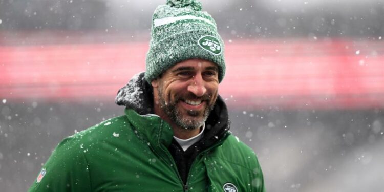 Jan 7, 2024; Foxborough, Massachusetts, USA; New York Jets quarterback Aaron Rodgers (8) walks off of the field before a game against the New England Patriots at Gillette Stadium. Mandatory Credit: Brian Fluharty-USA TODAY Sports