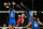 Italy's #11 Anna Danesi and Italy's #18 Paola Ogechi Egonu jump to block a ball from US' #22 Kathryn Plummer in the women's volleyball gold medal match between USA and Italy at the South Paris Arena 1 in Paris during the Paris 2024 Olympic Games on August 11, 2024. (Photo by PATRICIA DE MELO MOREIRA / AFP) (Photo by PATRICIA DE MELO MOREIRA/AFP via Getty Images)