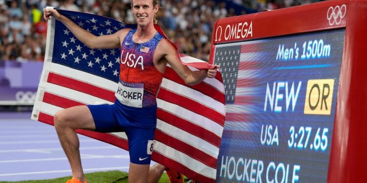 Cole Hocker, of the United States, celebrates after winning the men's 1500-meter final at the...