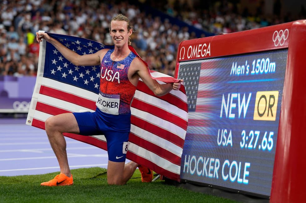 Cole Hocker, of the United States, celebrates after winning the men's 1500-meter final at the...