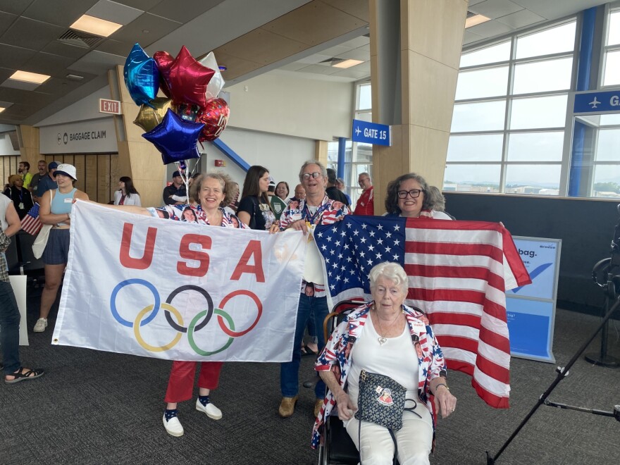 Members of Ilona Maher's family sport team U.S.A colors and flags 