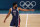 PARIS, FRANCE - AUGUST 10: Joel Embiid #11 of Team United States looks on during the Men's Gold Medal game between Team France and Team United States on day fifteen of the Olympic Games Paris 2024 at Bercy Arena on August 10, 2024 in Paris, France. (Photo by Jamie Squire/Getty Images)