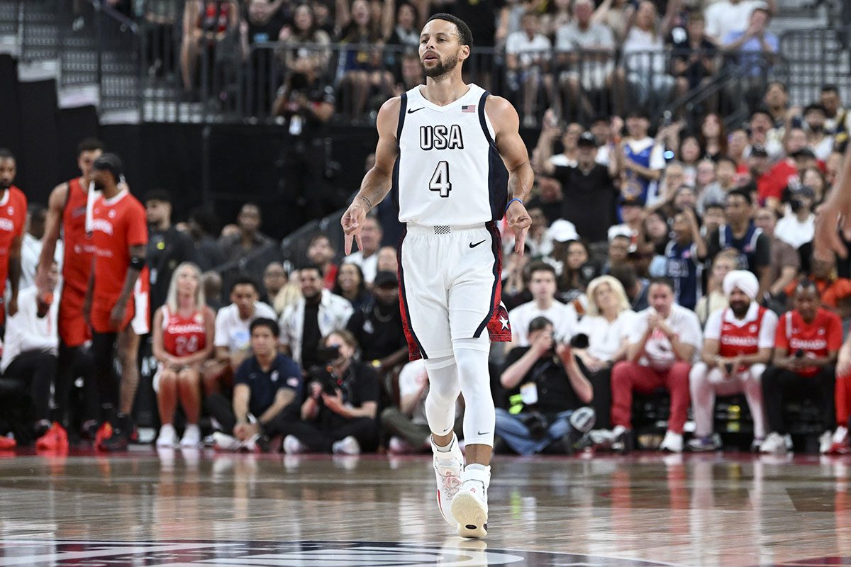 Jul 10, 2024; Las Vegas, Nevada, USA; USA guard Steph Curry (4) celebrates scoring on Canada during the first quarter of the USA Basketball Showcase at T-Mobile Arena.