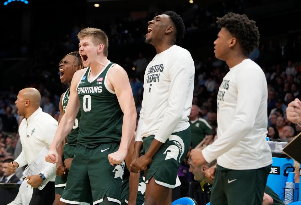 March 23, 2024, Charlotte, NC, USA; Michigan State Spartans forward Jaxon Kohler (0) and teammates react against the North Carolina Tar Heels in the second round of the 2024 NCAA Tournament at the Spectrum Center. Mandatory Credit: Bob Donnan-USA TODAY Sports