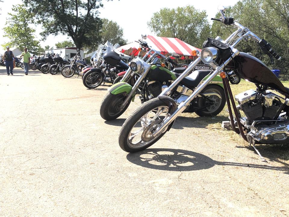 A line of motorcycles stood outside the vendors' area at the 45th annual Abate of Kansas National Labor Day Rally at Lake Perry.