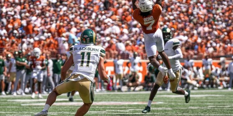 Texas Longhorns receiver Isaiah Bond (7) catches a pass during the game against Colorado State at Darrell K Royal-Texas Memorial Stadium in Austin Saturday, Aug. 31, 2024.