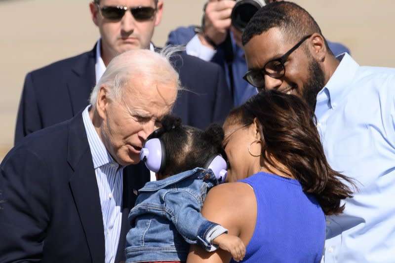 President Joe Biden greets local Pennsylvania dignitaries and their families at the 171st Air Refueling Wing before departing for a rally with labor leaders in Pittsburgh on Labor Day. Photo by Archie Carpenter/UPI.