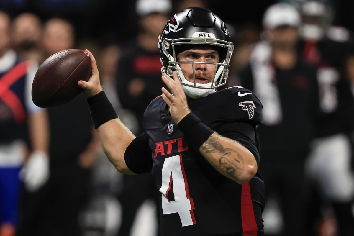 Atlanta Falcons quarterback Taylor Heinicke works in the pocket against the Jacksonville Jaguars.