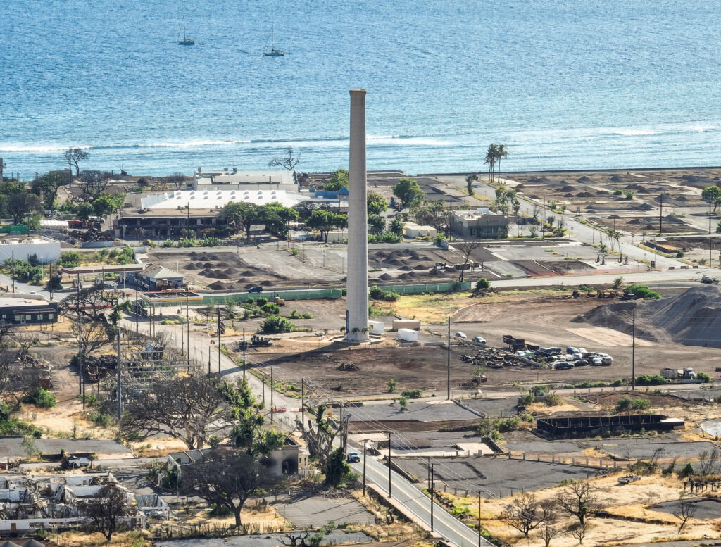 The Pioneer Mill smokestack stands after the Aug. 8 fires destroyed most of Lahaina. (Nathan Eagle/Civil Beat/2024)