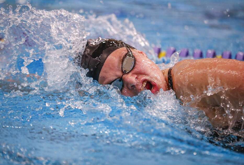 Chambers practices October 18, 2023, with the UNI women's swim team at the Wellness/Recreation Center. (Chris Zoeller/Waterloo-Cedar Falls Courier)