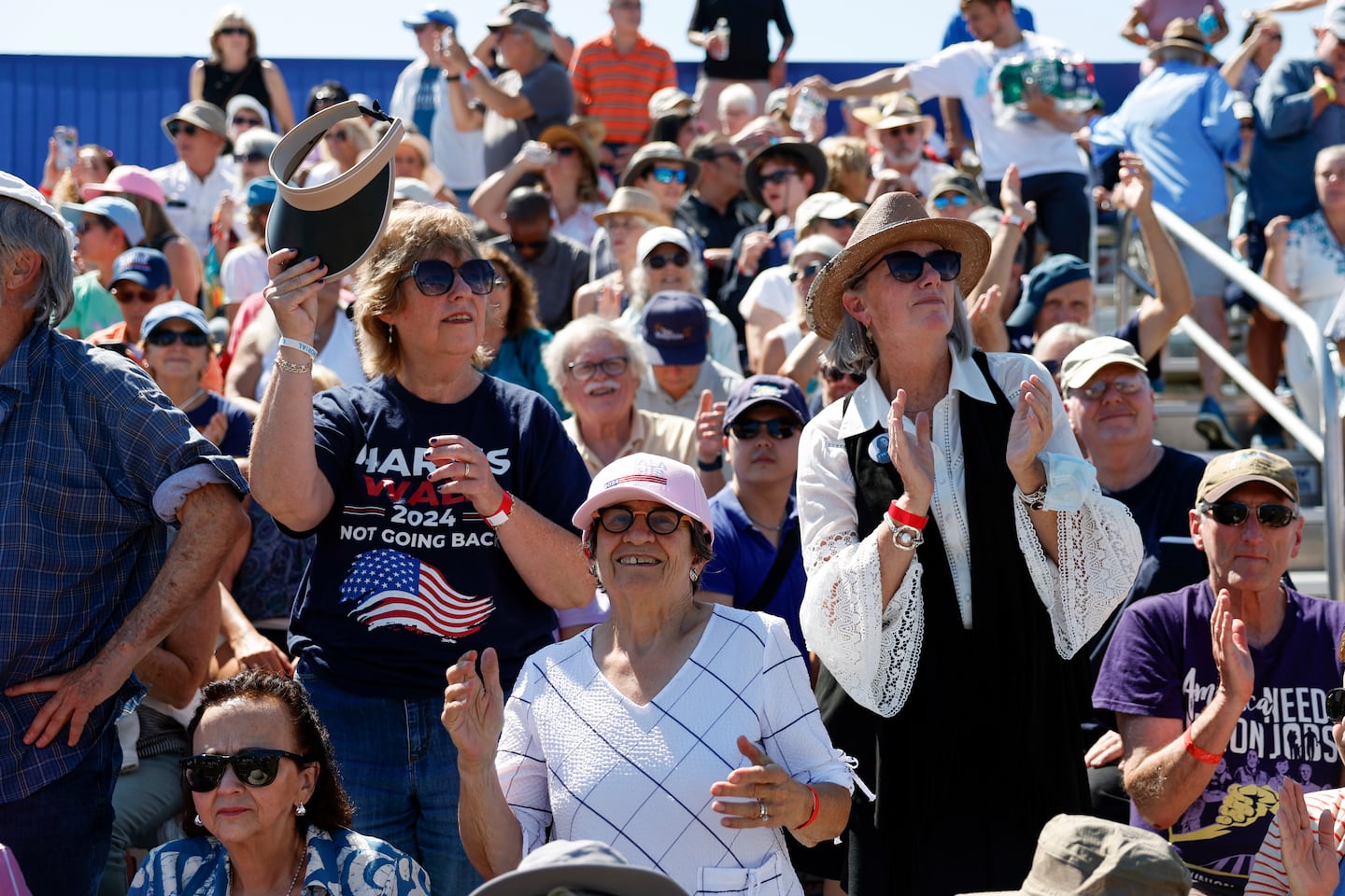 Supporters danced and waited for Kamala Harris before a campaign event North Hampton, N.H.