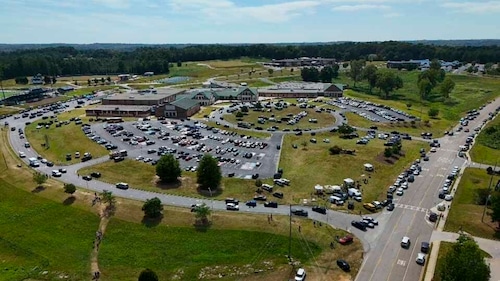 Shooter kills 4 at a Georgia high school and a 14-year-old student is in custody, officials say