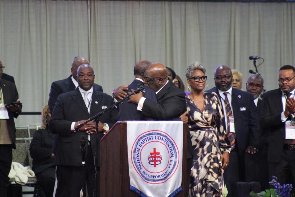 Connecticut pastor Rev. Boise Kimber, president-elect of the National Baptist Convention, USA, and Mississippi pastor Rev. Jerry Young, outgoing president of the Nashville-based denomination, embrace one another following Kimber's election victory in a high-stakes election during the convention's 2024 annual session at the Baltimore Convention Center on Thursday, Sept. 5, 2024.