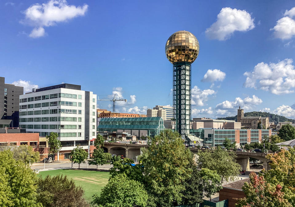 Knoxville, TN, USA - October 9, 2021: Knoxville skyline with the Sunsphere and the World's Fair park which was developed for the 1982 World's Fair in the foreground.