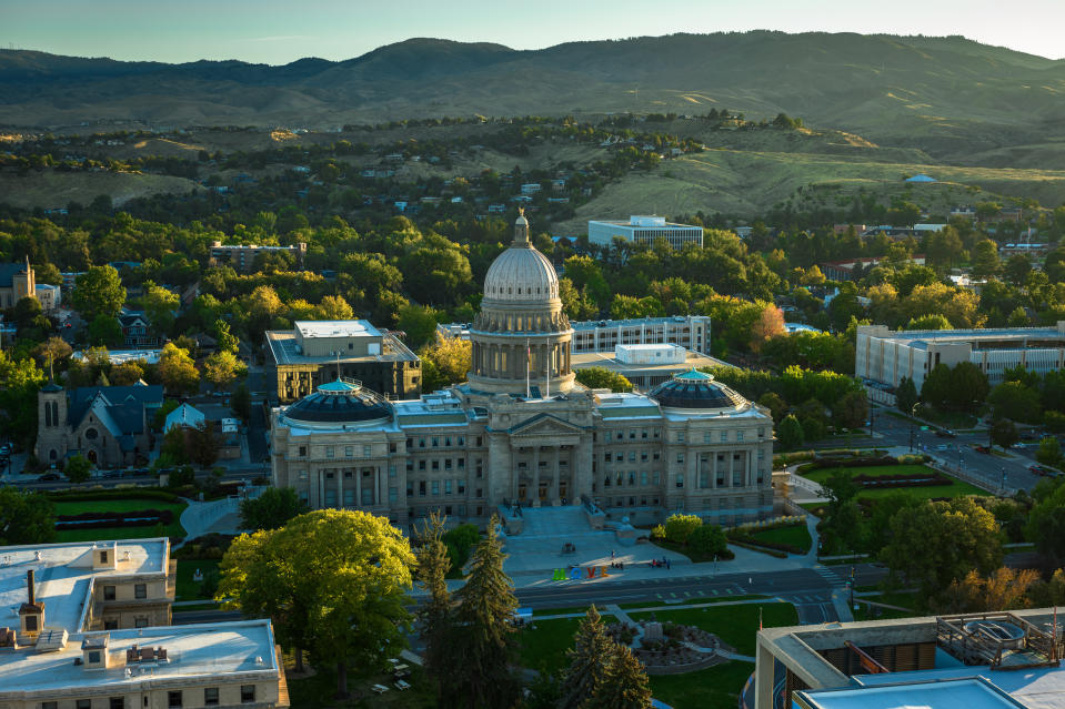 Aerial shot of the Idaho State Capitol building in downtown Boise at sunrise on a Fall morning.

Authorization was obtained from the FAA for this operation in restricted airspace.