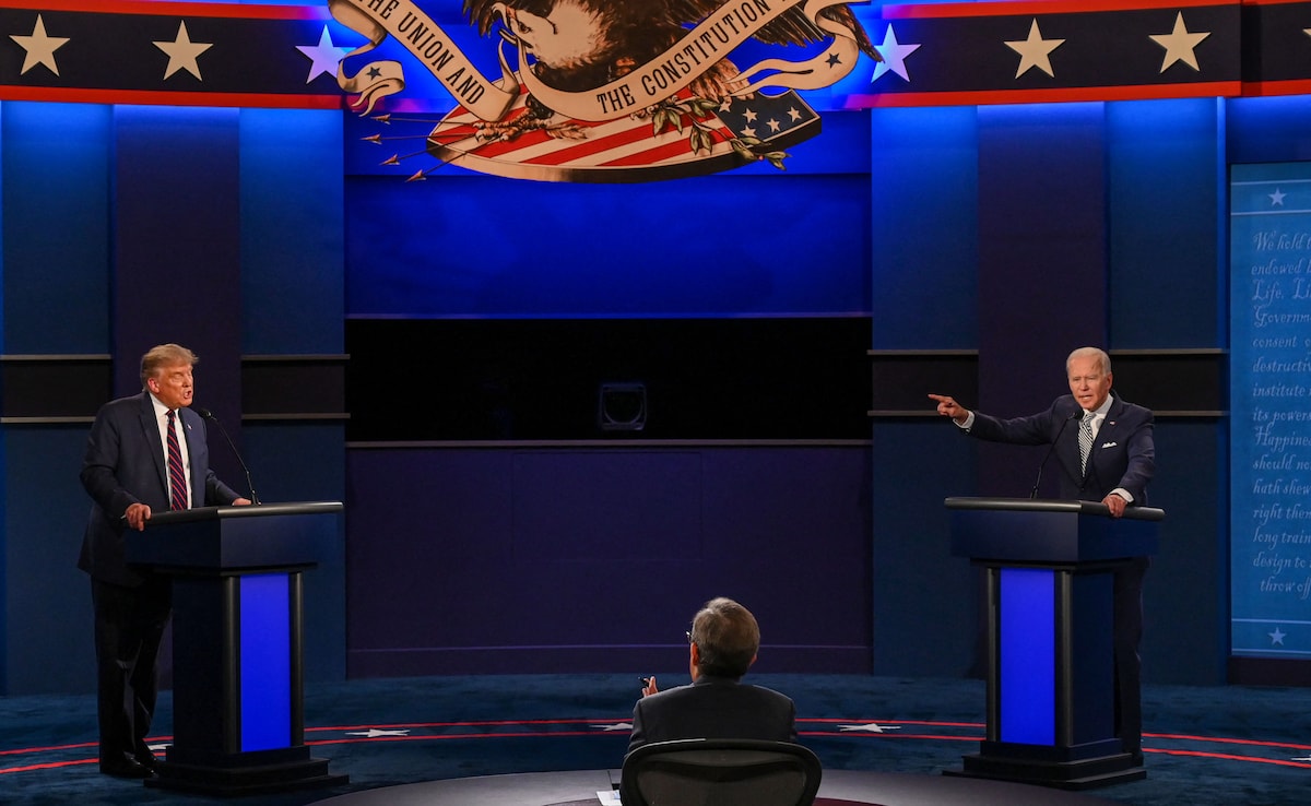 The then US President Donald Trump (L) and Democratic Presidential candidate Joe Biden exchange arguments during the first presidential debate at Case Western Reserve University and Cleveland Clinic in Cleveland, Ohio, on September 29, 2020