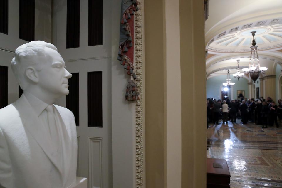 A bust of former U.S. President Richard Nixon is displayed in the corridor where Senate Minority Leader Chuck Schumer (D-NY) holds his weekly news conference at the U.S. Capitol in Washington, U.S. December 17, 2019. REUTERS/Jonathan Ernst