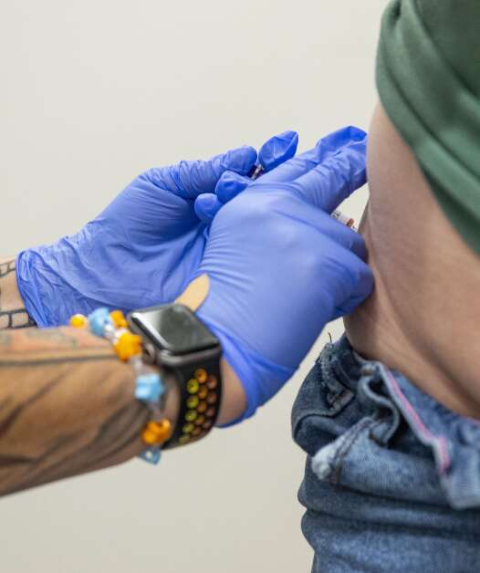 Certified clinical medical assistant Chelsea Morning gives an intra-articular birth control shot Aug. 30 to a patient at the Planned Parenthood clinic in Mankato, Minn. (Savannah Blake/The Gazette)