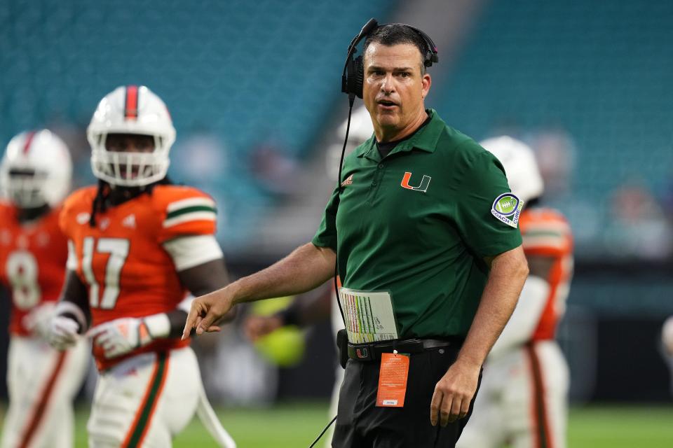 Sep 24, 2022; Miami Gardens, Florida, USA; Miami Hurricanes head coach Mario Cristobal walks onto the field during the second half against the Middle Tennessee Blue Raiders at Hard Rock Stadium. Mandatory Credit: Jasen Vinlove-USA TODAY Sports