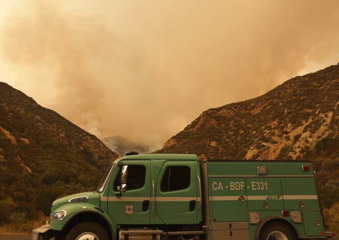 Smoke rises as the Line Fire burns on September 9, 2024, near Yucaipa, California.