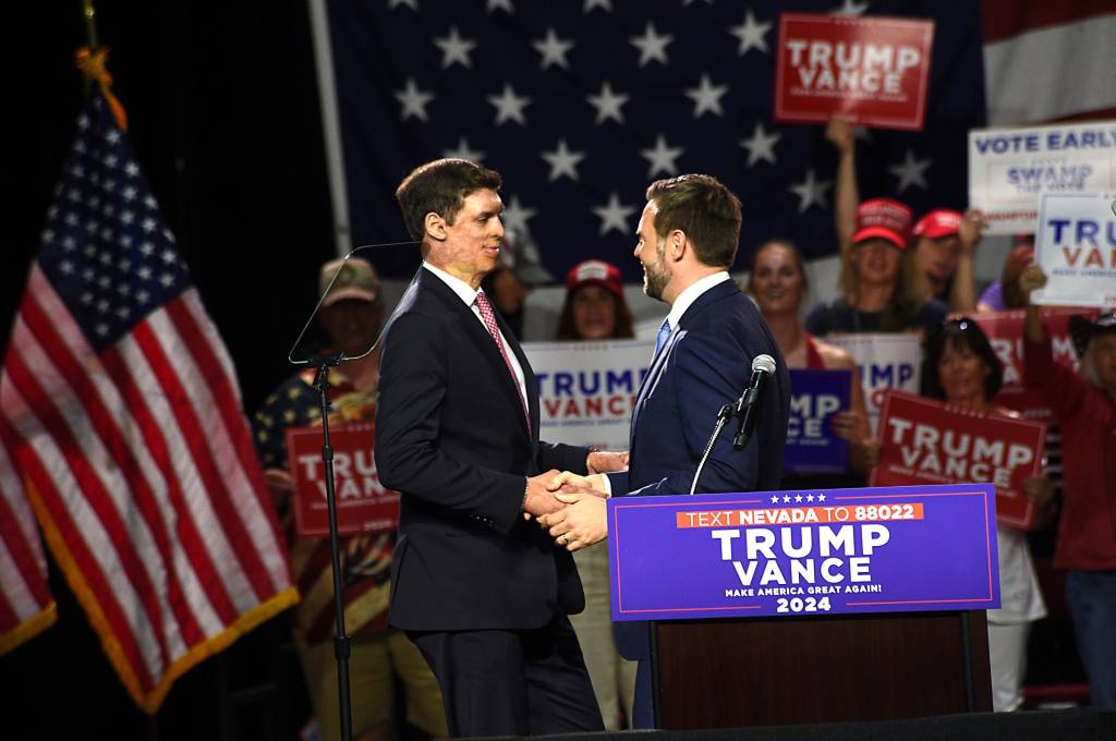 JD Vance greets Sam Brown at Las Vegas rally on July 30, 2024