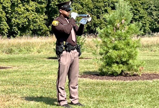 deputy playing trumpet