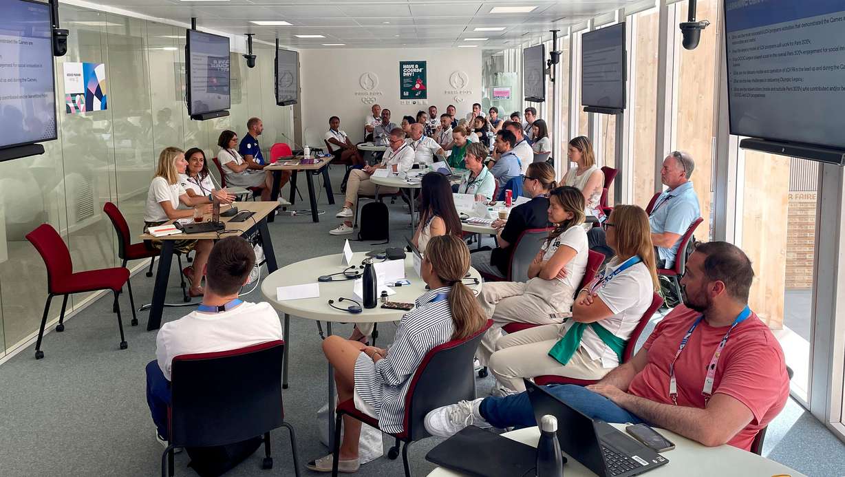 The Salt Lake City-Utah Committee for the Games participates in a roundtable discussion session called “Impact and Legacy” on July 30 at the Paris 2024 headquarters. Speaking is Marie Barsacq, Paris 2024 director of impact and legacy.