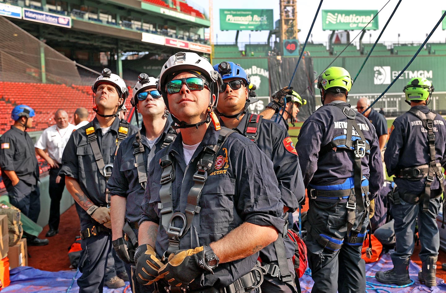 Firefighters  from the South Eastern Massachusetts Tech Rescue Team watched during the joint training with five technical rescue divisions from Massachusetts along with the Boston Fire Department. 