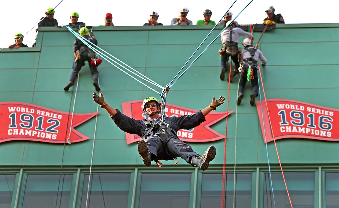 Chelsea firefighter Chris Lehmann seemed to fly through the air after jumping off the Fenway Park press booth roof.  