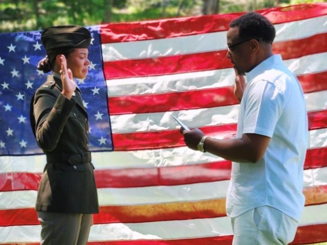 2nd Lt. Alma Cooper is sworn in as an Army officer by her father, retired Maj. Stacey Cooper, on May 27, 2023. It was exactly 24 years to the day that her father commissioned in the Army.