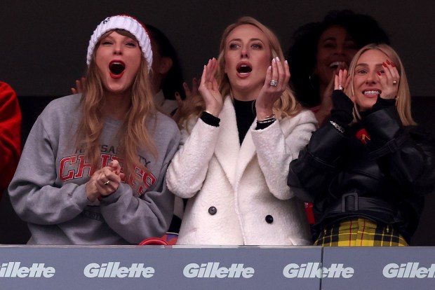 FOXBOROUGH, MASSACHUSETTS - DECEMBER 17: Taylor Swift, Brittany Mahomes, and Ashley Avignone cheer after a Kansas City Chiefs touchdown during the second quarter against the New England Patriots at Gillette Stadium on December 17, 2023 in Foxborough, Massachusetts. (Photo by Maddie Meyer/Getty Images)