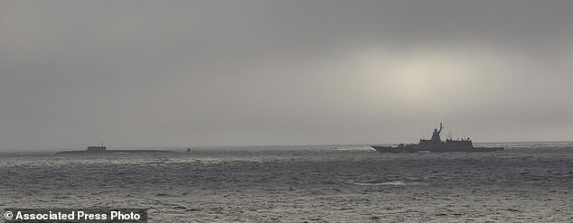 U.S. Coast Guard Cutter Stratton (right) shadows a Russian submarine about 57 miles northwest of Point Hope, Alaska on September 15