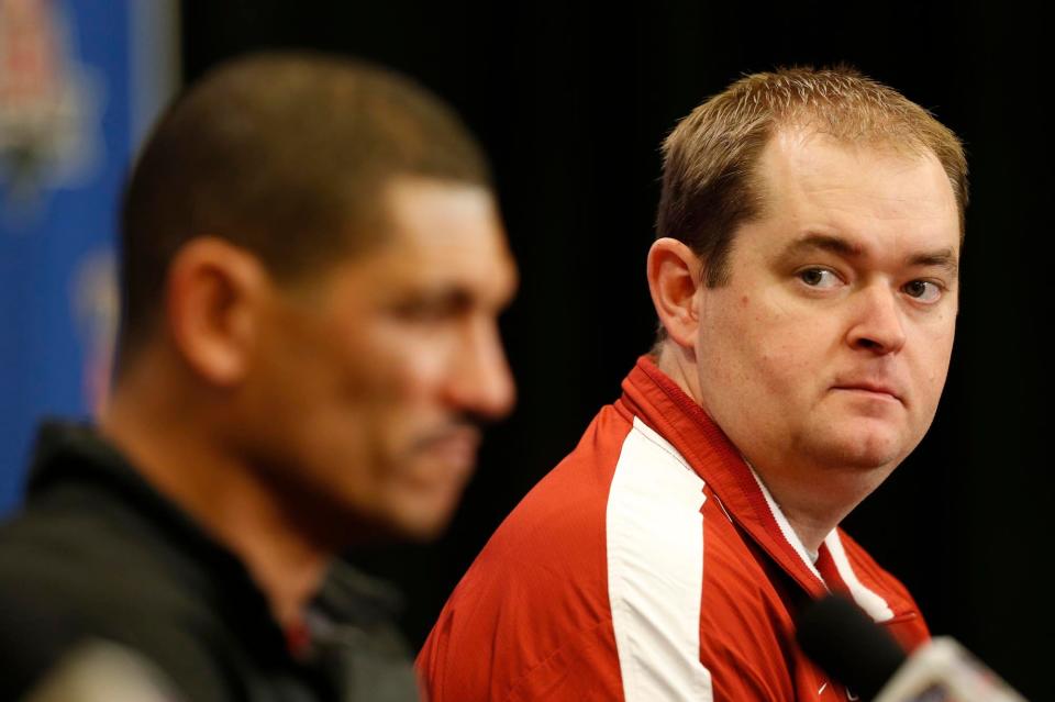 Oklahoma offensive co-coordinators Jay Norvell, left, and Josh Heupel, right, speak to the media during a press conference at the New Orleans Downtown Marriott at the Convention Center on Monday Dec. 30, 2013 in New Orleans, La. Alabama and Oklahoma will meet for the 2014 Sugar Bowl on Thursday Jan. 2, 2014. staff photo | Robert Sutton